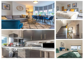 New 4BR family home sleeps 8 -10 people with free parking and contractors welcome